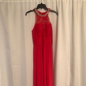 Red backless form fitting gown